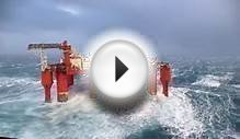 Huge waves crash against swaying North Sea oil rig - BBC