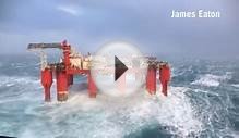 Scotland storm: Giant waves crash into a swaying oil rig