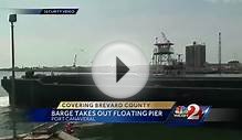 Tugboat, barge take out floating pier in Port Canaveral